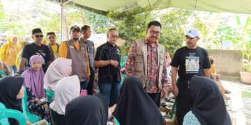 Asep Japar Jadi Petugas Pendaftaran Pengobatan Gratis di Simpenan